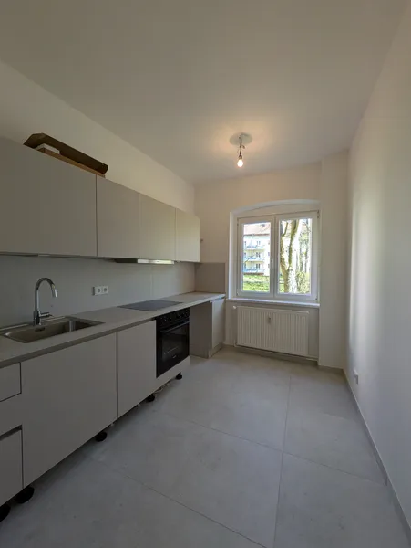 Erstbezug: 2 Zimmer Wohnung mit Balkon und Einbauküche im Herzen von Weißensee zu vermieten! — photo 1